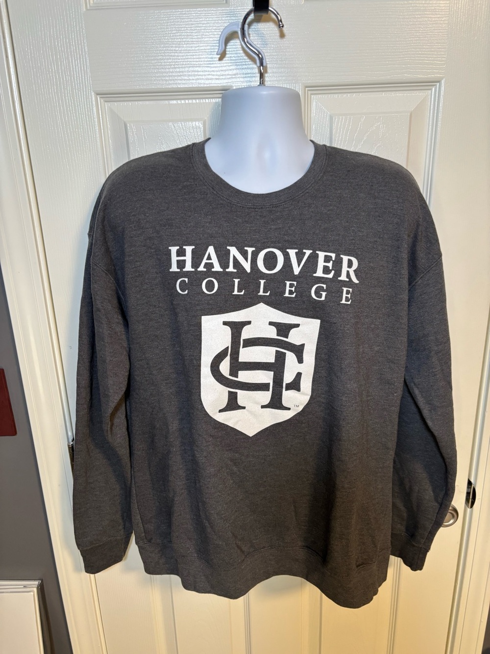 Gray Hanover College crewneck sweatshirt with white text and shield logo, size L
